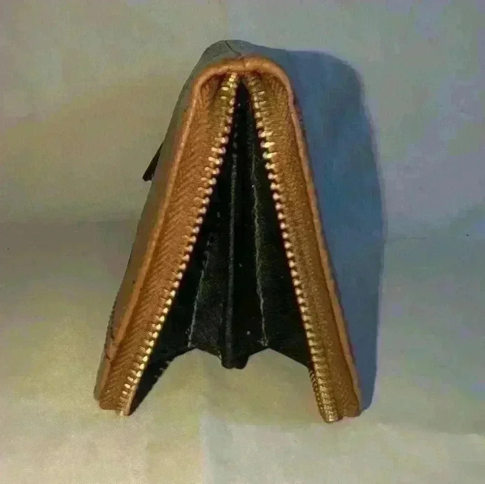 Brown Pebble Leather Fossil Zipper Wallet with Black Leathers Tassle